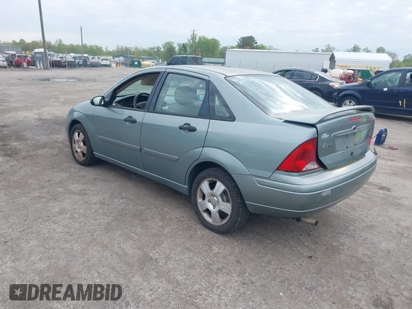 2004 Ford Focus ZTS with VIN 1FAFP38Z74W117402, listed as a IAAI auction lot 42035928 with 113,393 mi miles and . Bid and sale history available at carsss.com. Image 3.
