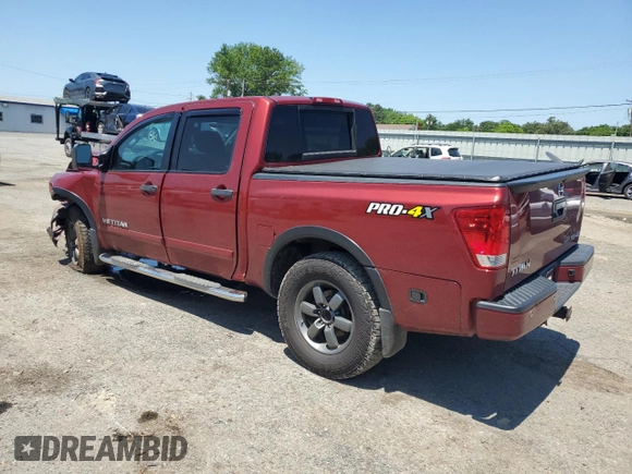 2015 Nissan Titan Pro-4X with VIN 1N6BA0EC5FN506358, listed as a Copart auction lot 56671205 with 153,712 mi miles and Salvage title. Bid and sale history available at DreamBid. Image 2.