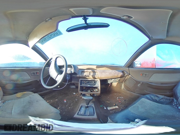 1989 Honda Civic z VIN JHMED6451KS002428, wystawiony jako Copart lot #86497404 z przebiegiem 241 207 mil mil oraz Szkoda całkowita • Salvage title. Historia ofert i sprzedaży dostępna na DreamBid. Obrazek 13.