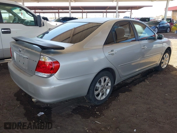 2006 Toyota Camry LE z VIN 4T1BF30K96U115963, wystawiony jako IAAI lot #41616833 z przebiegiem 237 404 mil mil oraz . Historia ofert i sprzedaży dostępna na DreamBid. Obrazek 4.