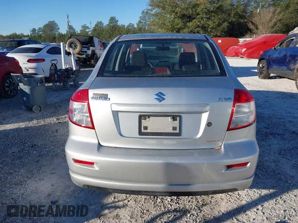 2010 Suzuki SX4 with VIN JS2YC5A46A6310134, listed as a IAAI auction lot 41696108 with 147,059 mi miles and . Bid and sale history available at DreamBid. Image 16.