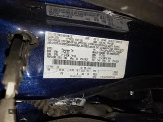 2016 Ford Focus Titanium z VIN 1FADP3J27GL310367, wystawiony jako Copart lot #55048005 z przebiegiem 86 676 mil mil oraz Szkoda całkowita • Salvage title. Historia ofert i sprzedaży dostępna na DreamBid. Obrazek 13.