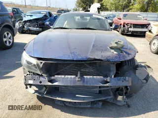 2013 BMW Z4 sDrive35i with VIN WBALM7C57DE385564, listed as a Copart auction lot 60422134 with 56,017 mi miles and Salvage Title. Bid and sale history available at carsss.com. Image 5.