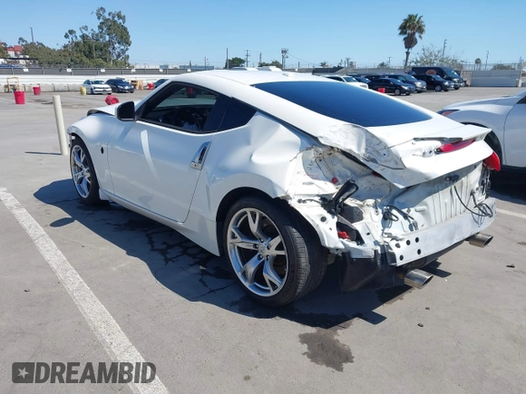 2009 Nissan 370Z Touring with VIN JN1AZ44E99M411252, listed as a IAAI auction lot 41969671 with 91,873 mi miles and . Bid and sale history available at DreamBid. Image 3.
