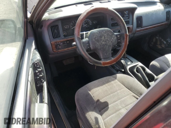 1998 Jeep Grand Cherokee Laredo with VIN 1J4GZ48Y7WC321234, listed as a Copart auction lot 75438624 with 0 mi miles and Salvage Title. Bid and sale history available at carsss.com. Image 8.