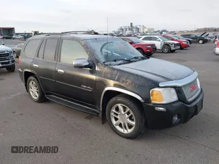 2008 GMC Envoy Denali with VIN 1GKET63M482256192, listed as a IAAI auction lot 41238036 with 163,669 mi miles. Bid and sale history available at carsss.com. Image 1.