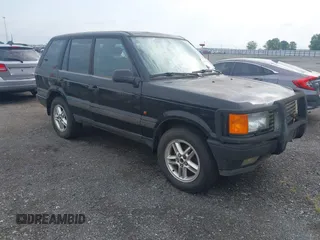 1999 Land Rover Range Rover z VIN SALPV1440XA412936, wystawiony jako IAAI lot #42271704 z przebiegiem 156 881 mil mil oraz . Historia ofert i sprzedaży dostępna na DreamBid. Obrazek 1.