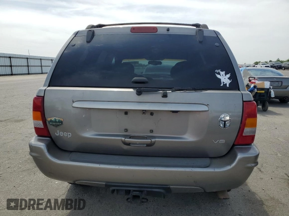 1999 Jeep Grand Cherokee Limited with VIN 1J4GW68N4XC663476, listed as a Copart auction lot 52449925 with 174,583 mi miles and Salvage Title. Bid and sale history available at carsss.com. Image 6.