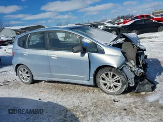 2009 Honda Fit Sport with VIN JHMGE884X9S026613, listed as a IAAI auction lot 41593112 with 144,736 mi miles. Bid and sale history available at carsss.com. Image 13.