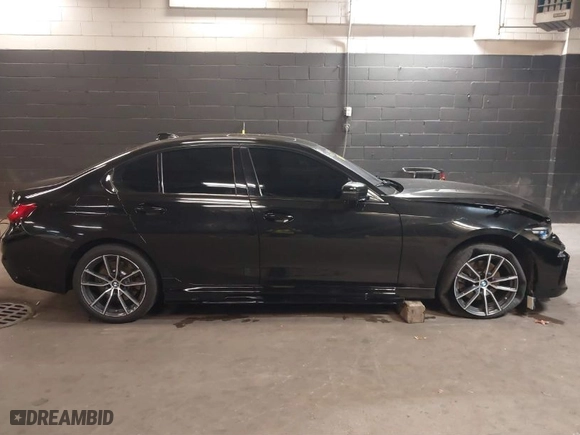 2020 BMW 3 Series 330i xDrive with VIN WBA5R7C05LFH42556, listed as a IAAI auction lot 40687893 with 74,290 mi miles. Bid and sale history available at carsss.com. Image 13.