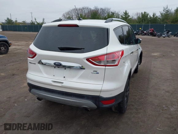 2016 Ford Escape SE z VIN 1FMCU9GX8GUA92661, wystawiony jako IAAI lot #41085877 z przebiegiem 76 632 mil mil oraz . Historia ofert i sprzedaży dostępna na DreamBid. Obrazek 4.