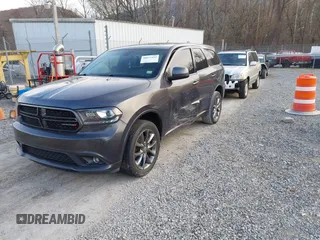 2015 Dodge Durango SXT with VIN 1C4RDJAG4FC784865, listed as a IAAI auction lot 40872452 with 145,877 mi miles and . Bid and sale history available at carsss.com. Image 17.