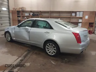 2014 Cadillac CTS Luxury AWD with VIN 1G6AX5S3XE0158960, listed as a IAAI auction lot 41258609 with 84,360 mi miles and . Bid and sale history available at DreamBid. Image 3.