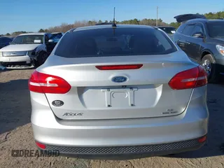 2015 Ford Focus SE with VIN 1FADP3F20FL355058, listed as a IAAI auction lot 41666337 with 144,887 mi miles. Bid and sale history available at carsss.com. Image 16.