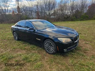 2012 BMW 7 Series 740i with VIN WBAKA4C52CC613791, listed as a Copart auction lot 82473894 with 132,656 mi miles and Clean Title. Bid and sale history available at carsss.com. Image 1.