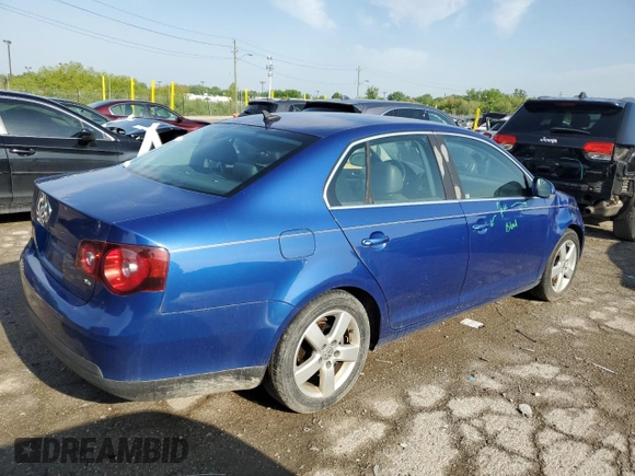2008 Volkswagen Jetta SE z VIN 3VWRM71K58M030606, wystawiony jako Copart lot #56830665 z przebiegiem 192 611 mil mil oraz Szkoda całkowita • Salvage title. Historia ofert i sprzedaży dostępna na DreamBid. Obrazek 3.