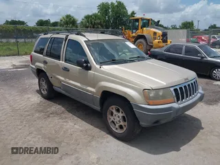 2001 Jeep Grand Cherokee Laredo z VIN 1J4GX48S31C564873, wystawiony jako IAAI lot #42310387 z przebiegiem 137 581 mil mil oraz . Historia ofert i sprzedaży dostępna na DreamBid. Obrazek 1.