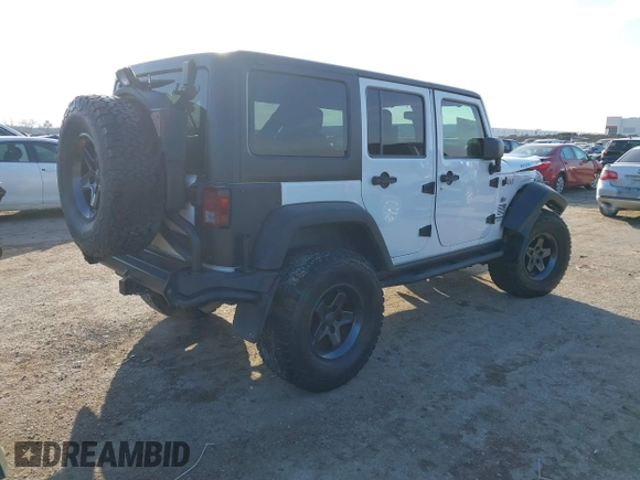 2013 Jeep Wrangler Unlimited Rubicon with VIN 1C4BJWFG0DL529739, listed as a IAAI auction lot 41587047 with 93,116 mi miles. Bid and sale history available at carsss.com. Image 4.