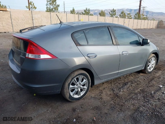 2011 Honda Insight EX with VIN JHMZE2H75BS006078, listed as a IAAI auction lot 41755652 with 209,774 mi miles. Bid and sale history available at carsss.com. Image 4.