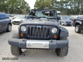 2011 Jeep Wrangler Unlimited Sahara with VIN 1J4HA5H19BL623123, listed as a Copart auction lot 72860734 with 0 mi miles and Non Repairable. Bid and sale history available at carsss.com. Image 5.