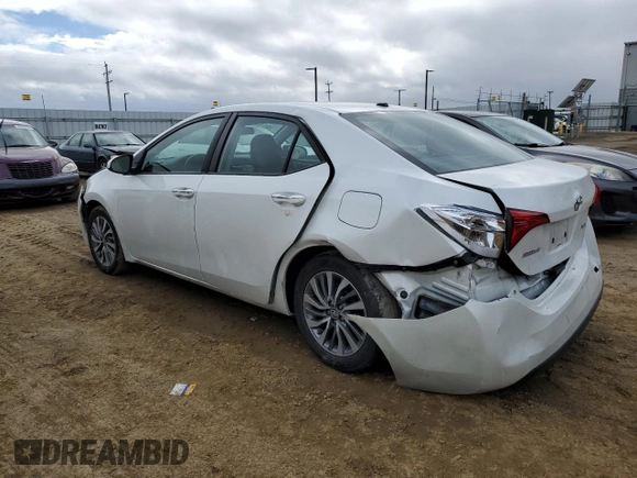 2019 Toyota Corolla L with VIN 5YFBURHE5KP891705, listed as a Copart auction lot 49501905 with 67,403 mi miles and Salvage Title. Bid and sale history available at DreamBid. Image 2.