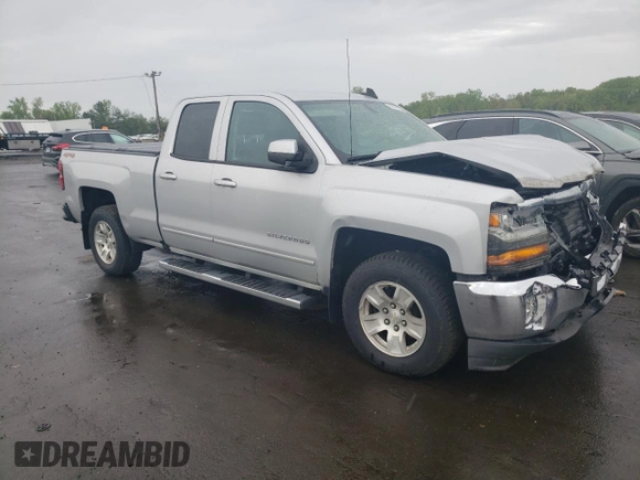 2018 Chevrolet Silverado 1500 LT with VIN 1GCVKREH8JZ102484, listed as a Copart auction lot 55114225 with 59,185 mi miles and Salvage Title. Bid and sale history available at DreamBid. Image 4.