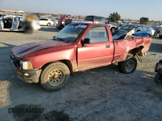 1992 Toyota Pickup z VIN 4TARN81A0NZ002490, wystawiony jako Copart lot #43082105 z przebiegiem 152 026 mil mil oraz Nie do naprawy • Non repairable. Historia ofert i sprzedaży dostępna na DreamBid. Obrazek 1.