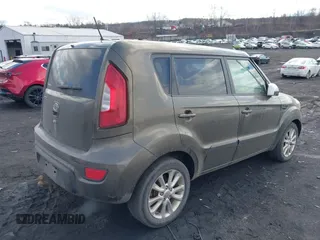 2012 Kia Soul + with VIN KNDJT2A60C7392564, listed as a IAAI auction lot 41702795 with 147,282 mi miles. Bid and sale history available at carsss.com. Image 4.