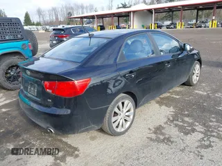 2010 Kia Forte SX with VIN KNAFW4A39A5054469, listed as a IAAI auction lot 41526636 with 115,008 mi miles. Bid and sale history available at carsss.com. Image 4.