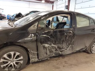 2022 Toyota Prius LE with VIN JTDL9MFU4N3035988, listed as a IAAI auction lot 41389054 with 56,633 mi miles. Bid and sale history available at carsss.com. Image 6.