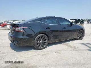 2019 Nissan Maxima SL z VIN 1N4AA6AV4KC374004, wystawiony jako Copart lot #59186745 z przebiegiem 121 571 mil mil oraz Szkoda całkowita • Salvage title. Historia ofert i sprzedaży dostępna na DreamBid. Obrazek 3.