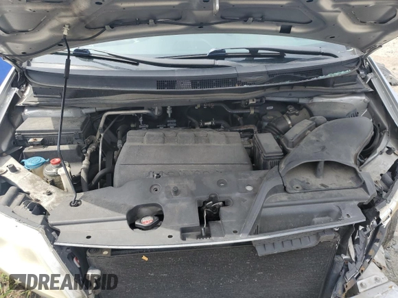 2013 Honda Odyssey LX z VIN 5FNRL5H28DB085114, wystawiony jako Copart lot #52942495 z przebiegiem 158 191 mil mil oraz Szkoda całkowita • Salvage title. Historia ofert i sprzedaży dostępna na DreamBid. Obrazek 12.