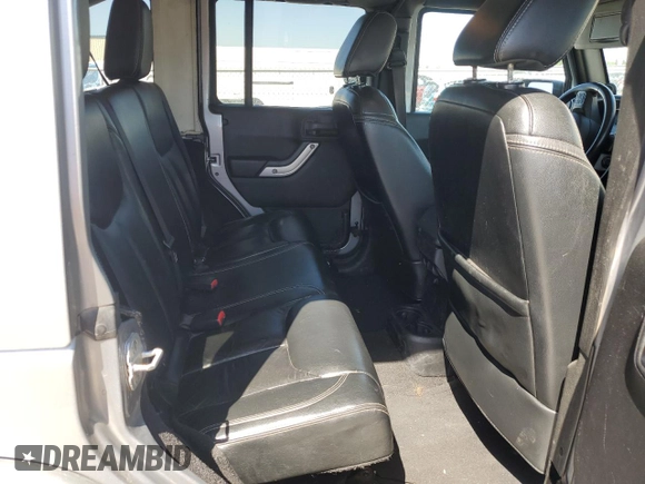 2013 Jeep Wrangler Unlimited Sahara with VIN 1C4BJWEG5DL662756, listed as a Copart auction lot 56423615 with 189,355 mi miles and Salvage title. Bid and sale history available at DreamBid. Image 10.