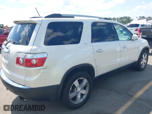 2011 GMC Acadia SLT2 with VIN 1GKKRSED1BJ235224, listed as a IAAI auction lot 42307216 with 158,126 mi miles and . Bid and sale history available at DreamBid. Image 4.