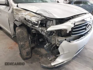 2013 Infiniti JX35 with VIN 5N1AL0MM1DC331291, listed as a IAAI auction lot 42218682 with 218,366 mi miles and . Bid and sale history available at DreamBid. Image 6.