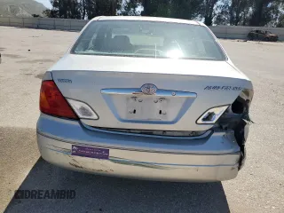 2001 Toyota Avalon XL z VIN 4T1BF28B11U154831, wystawiony jako Copart lot #57131435 z przebiegiem 211 745 mil mil oraz Szkody całkowita. Historia ofert i sprzedaży dostępna na DreamBid. Obrazek 6.