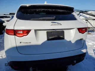 2019 Jaguar F-Pace 25t with VIN SADCS2FX0KA391899, listed as a Copart auction lot 42417155 with 103,728 mi miles and Salvage title. Bid and sale history available at DreamBid. Image 6.