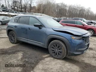 2023 Mazda CX-50 S Select with VIN 7MMVABAM1PN152981, listed as a Copart auction lot 46696195 with 30,857 mi miles and Salvage Title. Bid and sale history available at DreamBid. Image 4.
