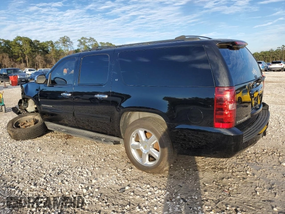 2011 Chevrolet Suburban LT with VIN 1GNSCJE03BR158949, listed as a Copart auction lot 86260394 with 197,012 mi miles and Salvage Title. Bid and sale history available at carsss.com. Image 2.