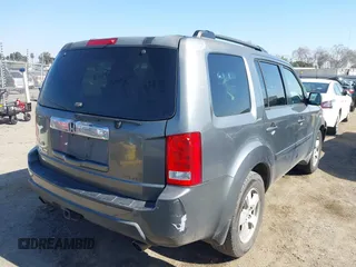 2009 Honda Pilot EX with VIN 5FNYF48439B036957, listed as a IAAI auction lot 41656284 with 199,115 mi miles. Bid and sale history available at carsss.com. Image 4.