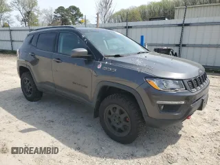 2019 Jeep Compass Trailhawk with VIN 3C4NJDDB9KT668729, listed as a Copart auction lot 51671255 with 116,398 mi miles and Clean Title. Bid and sale history available at DreamBid. Image 4.
