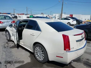 2010 Cadillac CTS with VIN 1G6DA5EG7A0135451, listed as a IAAI auction lot 41964313 with 136,172 mi miles and . Bid and sale history available at DreamBid. Image 3.