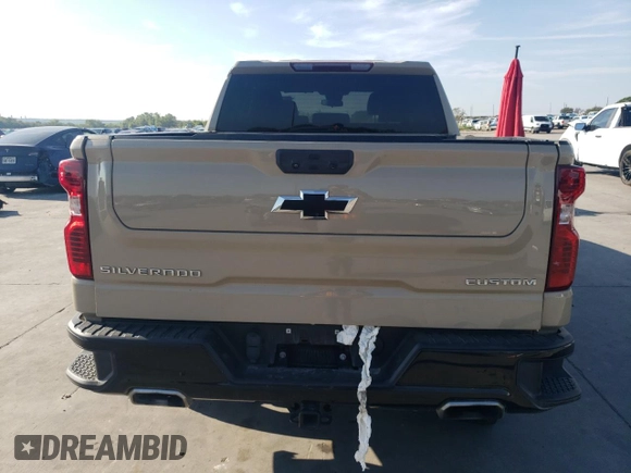 2022 Chevrolet Silverado 1500 Custom Trail Boss with VIN 3GCPDCED8NG613390, listed as a Copart auction lot 71494664 with 57,928 mi miles and Salvage Title. Bid and sale history available at DreamBid. Image 6.