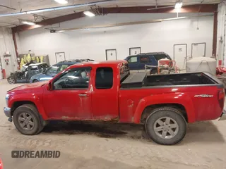 2011 GMC Canyon z VIN 1GTJ6NFE1B8109333, wystawiony jako IAAI lot #42035352 z przebiegiem 135 403 mil mil oraz . Historia ofert i sprzedaży dostępna na DreamBid. Obrazek 14.