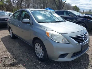2012 Nissan Versa SV with VIN 3N1CN7AP9CL819103, listed as a IAAI auction lot 42043126 with 137,818 mi miles. Bid and sale history available at carsss.com. Image 1.