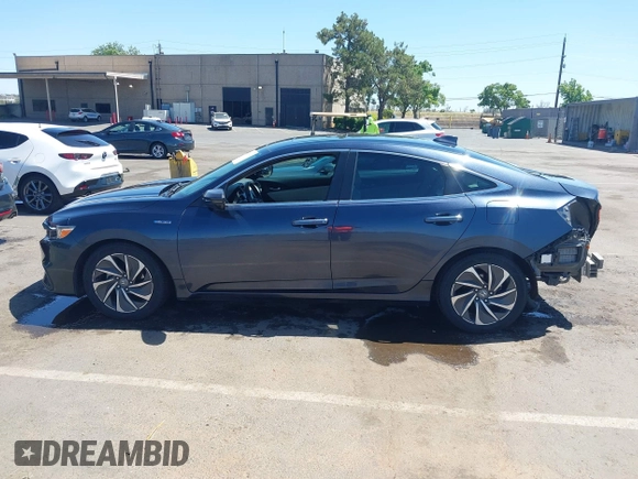 2022 Honda Insight Touring with VIN 19XZE4F90NE001251, listed as a IAAI auction lot 42303914 with 161,489 mi miles and . Bid and sale history available at DreamBid. Image 15.