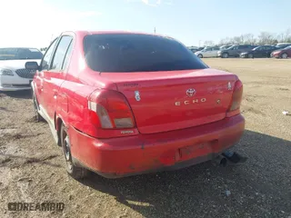 2001 Toyota ECHO with VIN JTDBT123810179774, listed as a IAAI auction lot 41913706 with NaN miles. Bid and sale history available at carsss.com. Image 3.