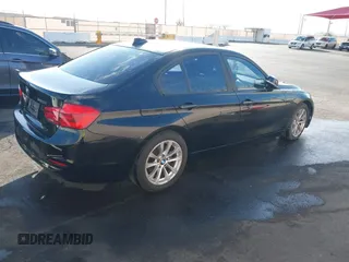 2017 BMW 3 Series 320i with VIN WBA8E1G50HNU14516, listed as a IAAI auction lot 41433532 with 119,742 mi miles. Bid and sale history available at carsss.com. Image 4.