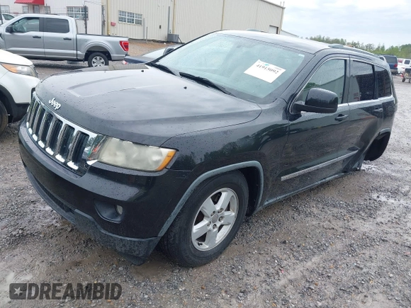 2011 Jeep Grand Cherokee Laredo with VIN 1J4RS4GG7BC569287, listed as a IAAI auction lot 41915092 with 211,148 mi miles and . Bid and sale history available at DreamBid. Image 2.
