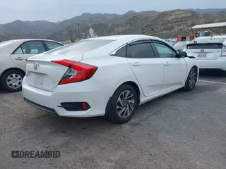2016 Honda Civic Sedan EX with VIN 2HGFC2F70GH530459, listed as a IAAI auction lot 41710538 with 136,470 mi miles. Bid and sale history available at carsss.com. Image 4.